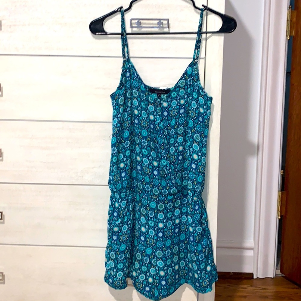 Flirty romper in beautiful blues!